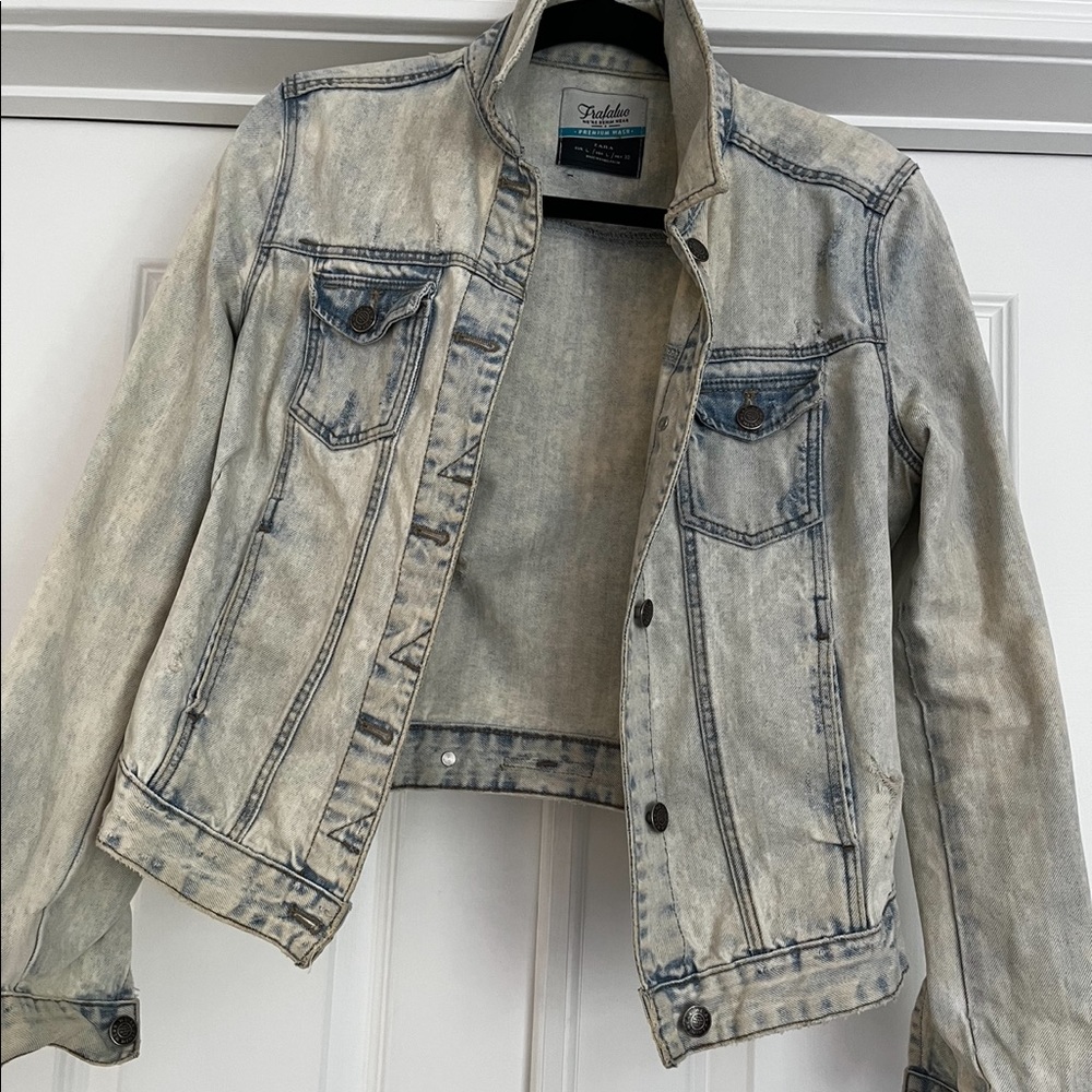 Distressed denim jacket